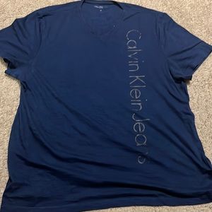 Calvin Klein blue v- neck T shirt